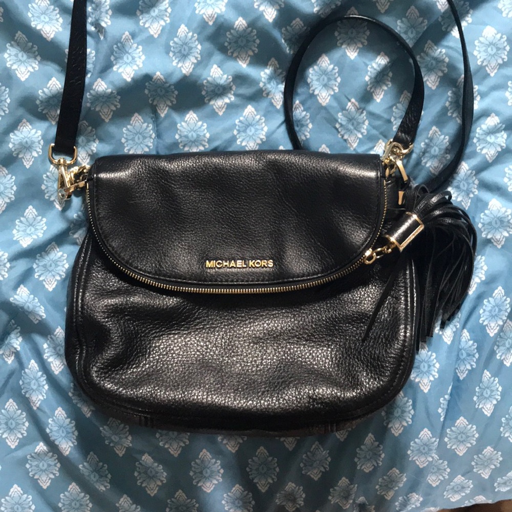 Michael Kors black leather purse with tassel